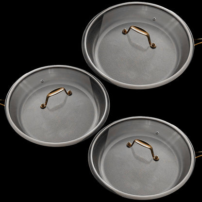 Three round Titanium steel saucepans with matching lids, each featuring a textured silver interior and a polished gold-toned handle, arranged on a solid black background.