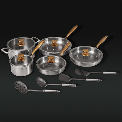 Set of stainless steel cookware with lids and utensils